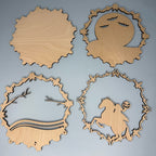 Four wooden cutouts with decorative patterns on a gray background