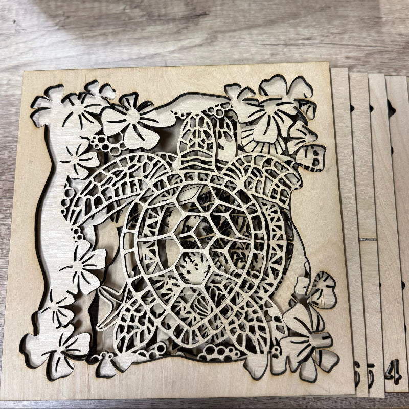 Wooden cutout of a design with floral elements on a wooden surface