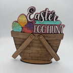 Decorative Easter sign with wooden basket and colorful eggs on a white background