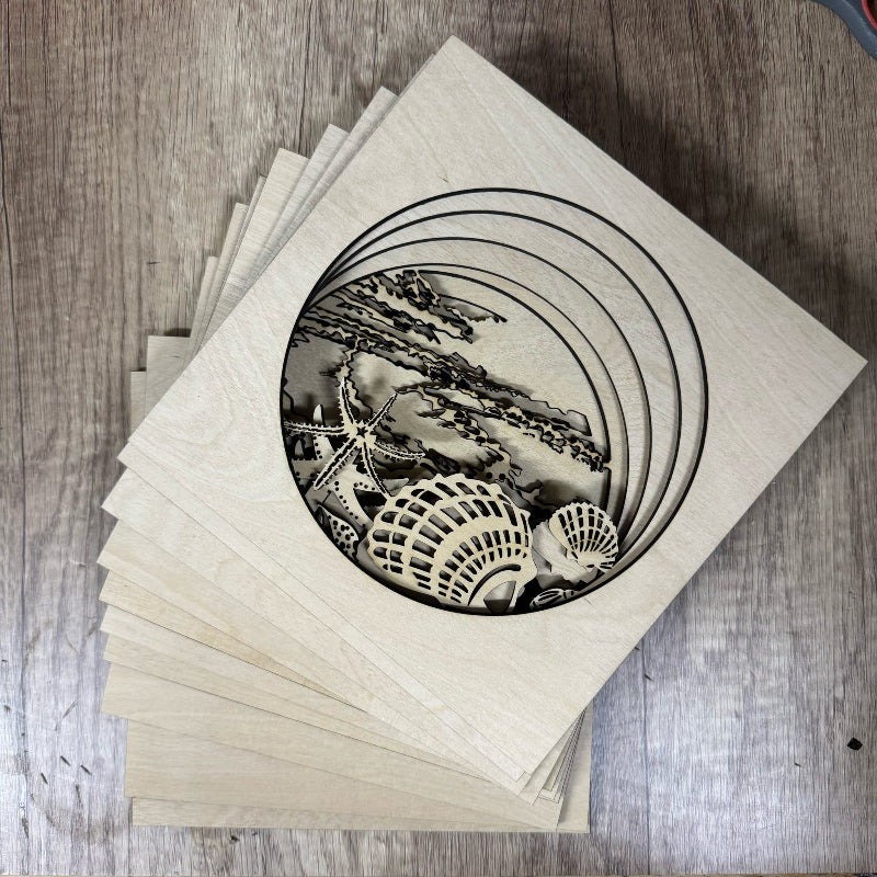 Stack of wooden coasters with a central cutout design on a wooden surface