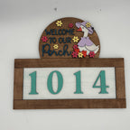 Decorative house number sign with a duck illustration and 'Welcome to our Porch' text on a white background.