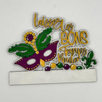 Decorative sign with Mardi Gras mask and text on a white background