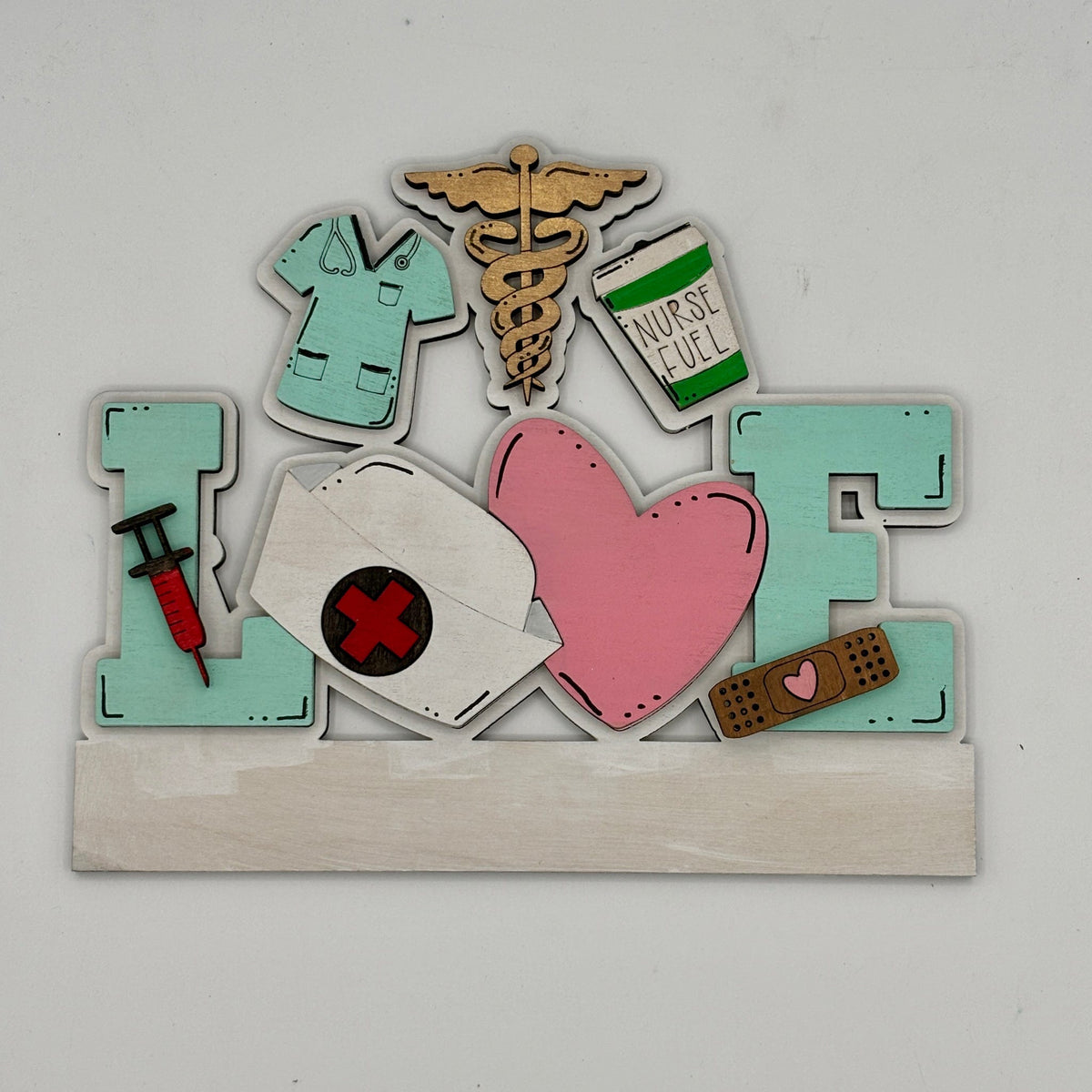 Decorative wall art with medical-themed elements on a white background