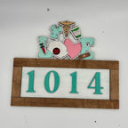 Decorative sign with 'I love 1014' on a white background