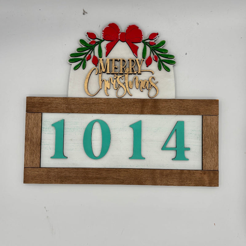 Christmas-themed house number sign with wreath and 'Merry Christmas' text on a white background