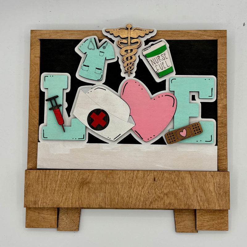 Decorative sign with medical-themed letters on a wooden stand
