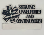 Decorative sign with caduceus, American flag, and text 'Serving Unselfishly and Continuously' on a white background.
