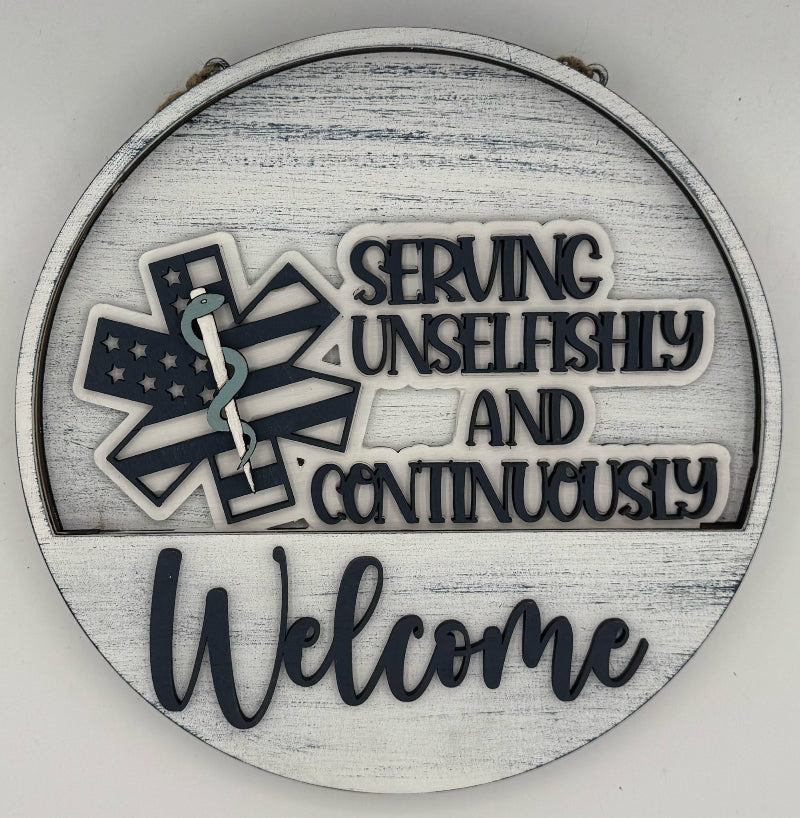 Decorative sign with text 'Serving unselfishly and continuously Welcome' on a white background