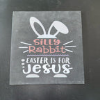 Transparent stencil with 'Silly Rabbit Easter is for Jesus' text on a black background