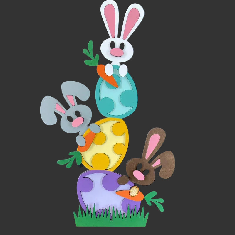 Colorful Easter-themed cutout with bunnies and eggs on a dark background