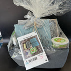 Gift basket with a tag on a black background