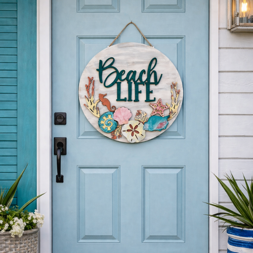 Blue door with 'Beach Life' wreath, starfish, and potted plants.