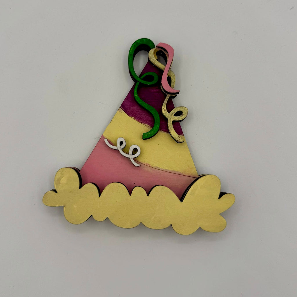 Colorful birthday hat decoration with 'happy' text on a white background