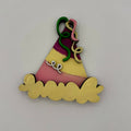 Colorful birthday hat decoration with 'happy' text on a white background