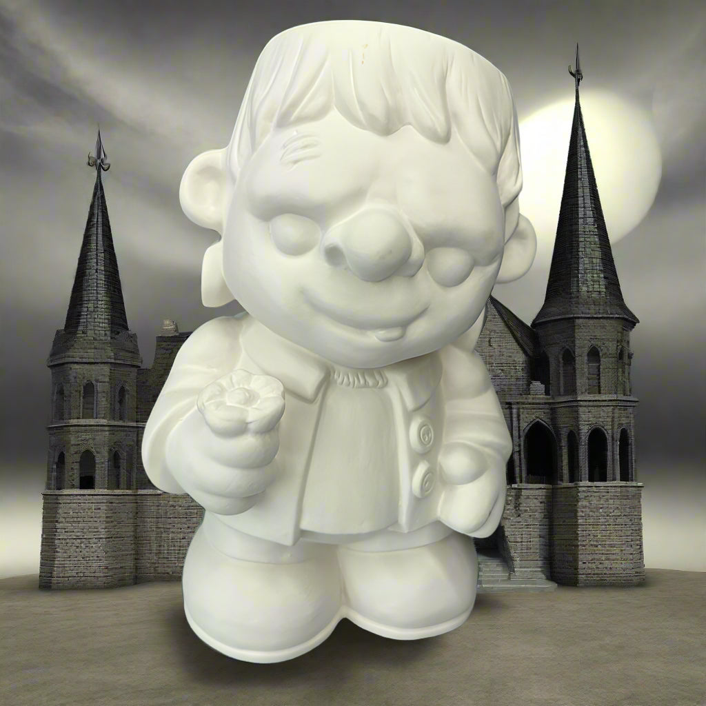 White ceramic gnome figurine on a wooden surface