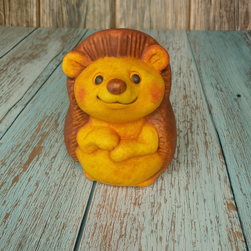 Plush lion toy on a wooden surface