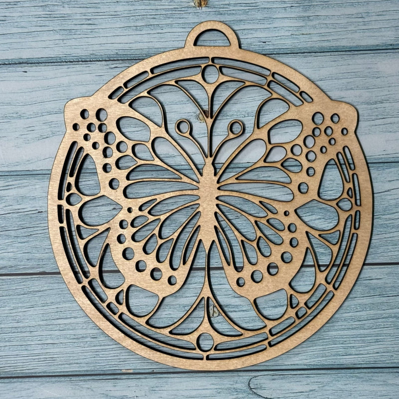 Decorative butterfly cutout on a wooden surface