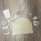 Wooden cutouts with 'Pumpkin Spice' and related designs on a wooden surface