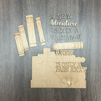 Wooden bookshelf decor with 'A New Adventure Is Only a Page Away' text on a wooden surface.