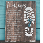 A wooden plaque with a poem titled 'Footsteps' and a footprint design underneath the title. Father's Day Design