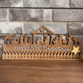 A wooden countdown to Christmas nativity scene with numbers from 1 to 24, and the text 'Days until Christmas'.