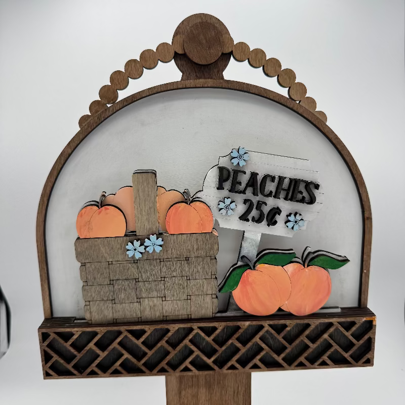 Decorative sign with pumpkins and peaches on a white background