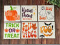 Six fall and Halloween wood sign designs for classrooms: Hello Fall, Hocus Pocus, Hey Boo, Trick or Treat, Fall Vibes and Boo
