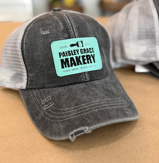 PGM Logo Tattered Trucker Hat with Teal Patch P13411