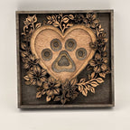 Wooden heart-shaped decoration with paw print design on a white background