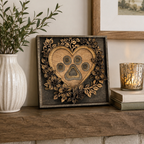 Decorative wall art with paw print design on a wooden frame, placed on a mantelpiece with a vase and candle.