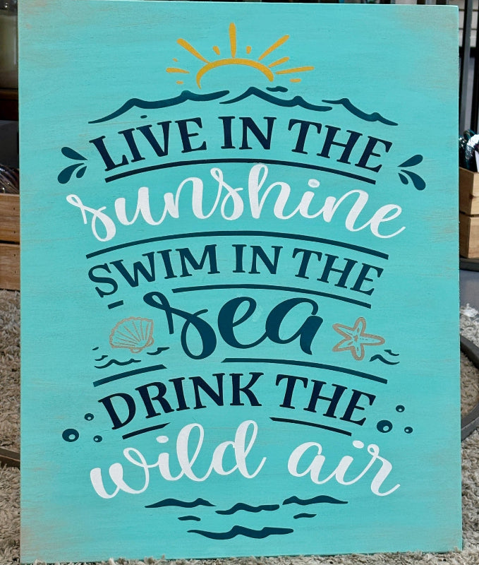 Motivational quote on a teal background with decorative elements.
