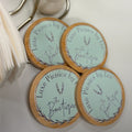 Round coasters with 'Luxe Picnics by Les' branding on a white surface.