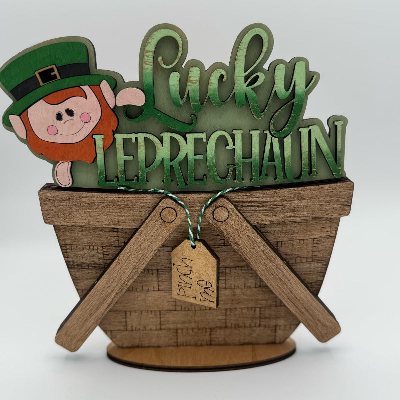 Decorative sign with a leprechaun and 'Lucky Leprechaun' text on a white background