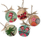 Set of five Christmas-themed ornaments with festive designs on a white background.
