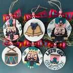 Set of Christmas ornaments with festive designs on a green background