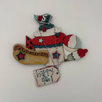 Decorative item with 'USA' and 'Happy 4th!' text on a white background