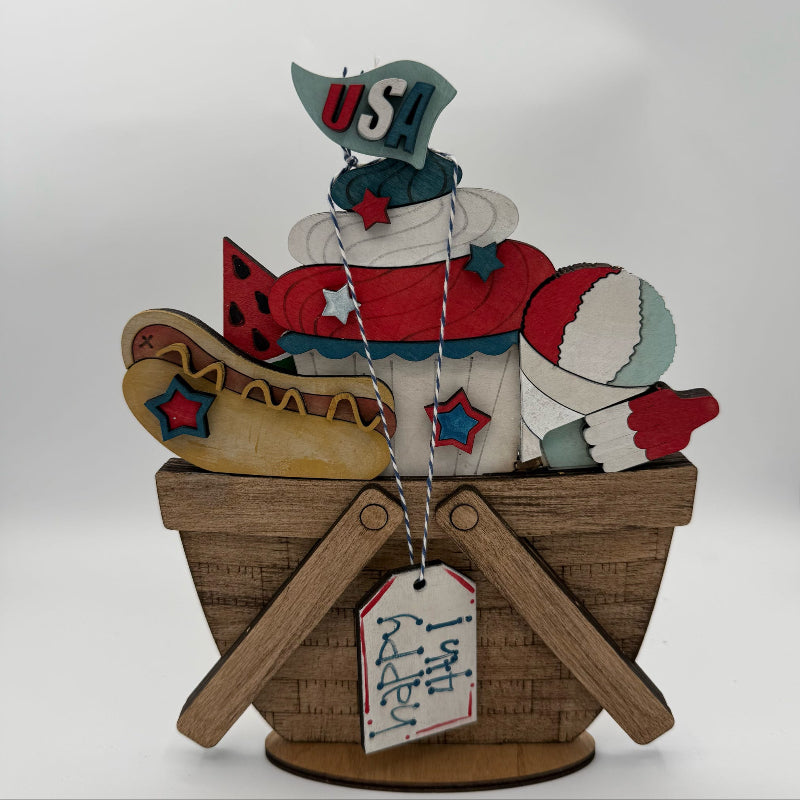 Decorative item with a hot dog, bun, and 'US!' sign on a white background