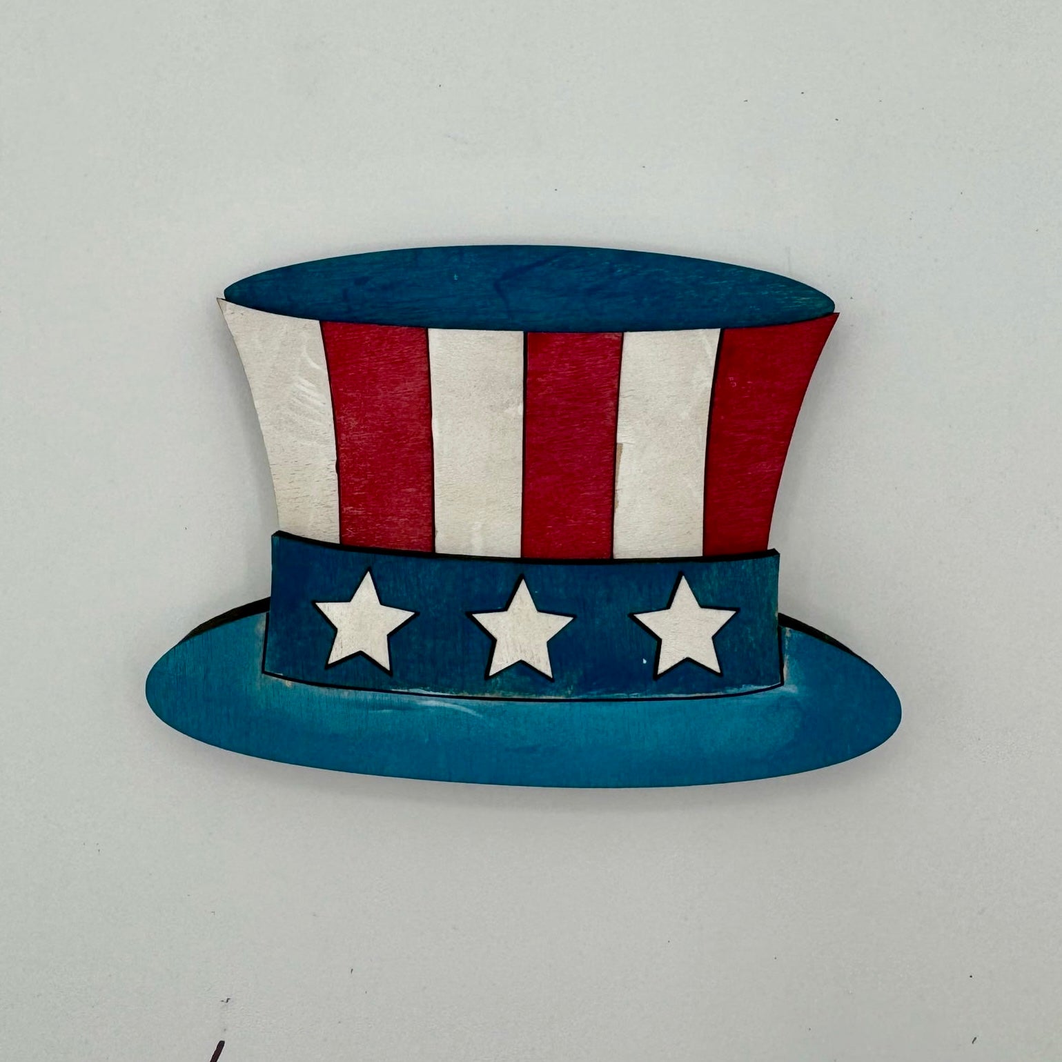 Top hat with American flag design on a white background