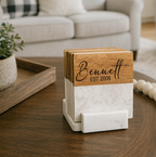 Coaster set with 'Bennett' branding on a coffee table in a living room setting.