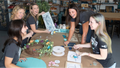 Collage of people holding decorative signs and engaging in craft activities.