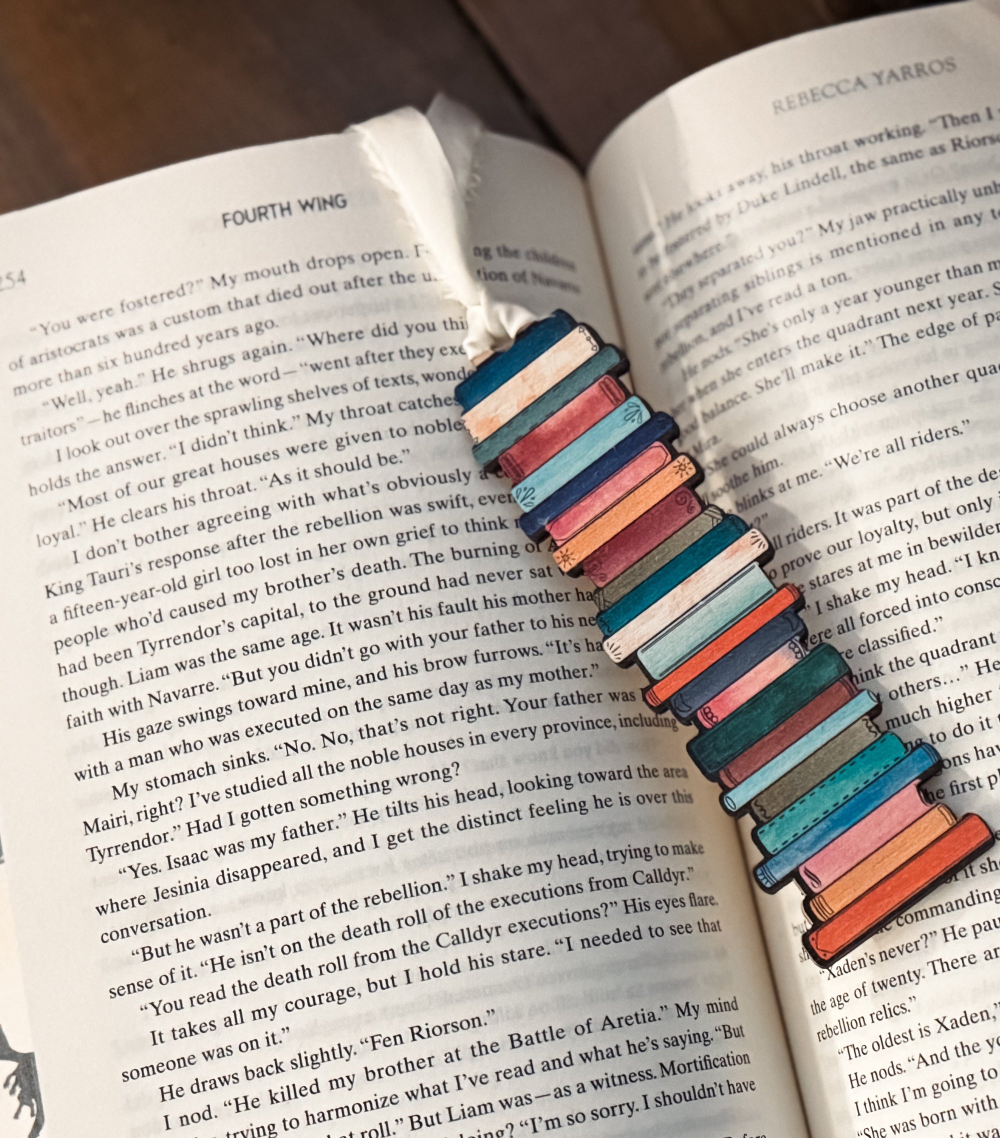 A wooden bookmark to track your books read for the year that turns into an ornament at the end of the year. 