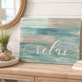 Decorative sign with 'Relax' on a wooden surface with plants and books. DIY kit. 