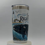 Tumbler with a design of a whale and lighthouse on a white background
