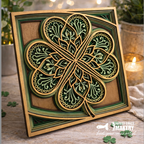 Decorative four-leaf clover card with intricate design on a wooden surface, blurred background