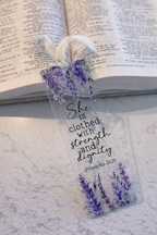 Decorative bookmark with lavender design and text on an open book
