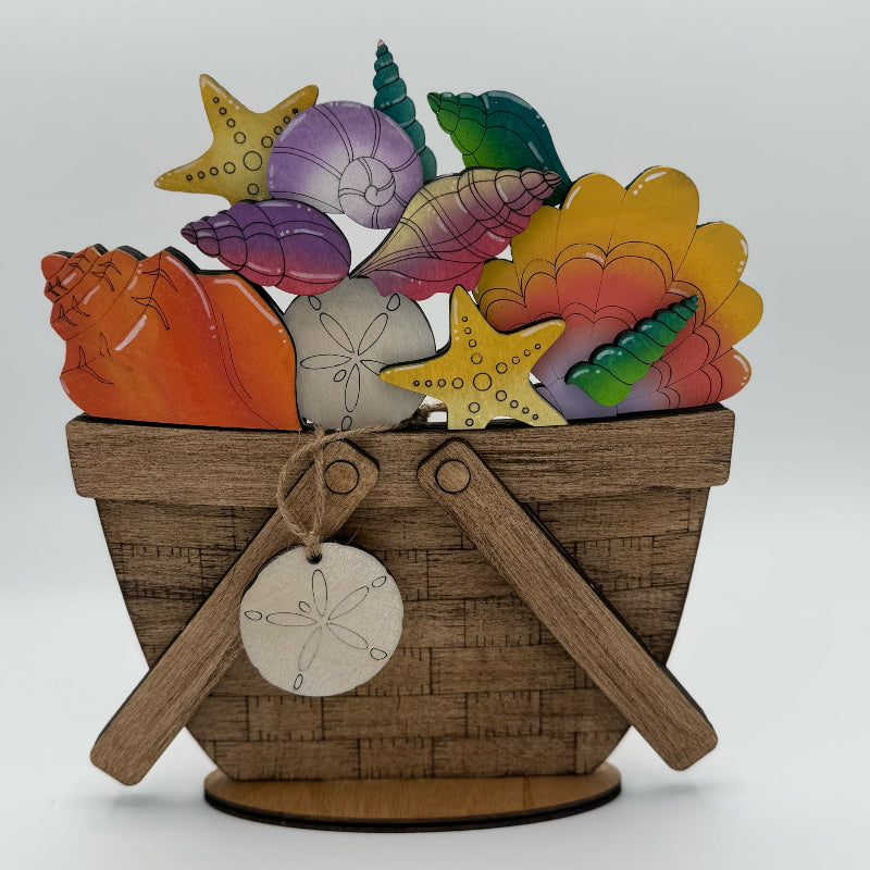 Decorative basket with seashells and starfish on a white background