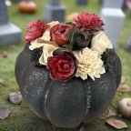 Decorative pumpkin with flowers on a table