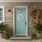 Decorative sign with 'Starfish wishes & Mistletoe kisses' text on a wooden background