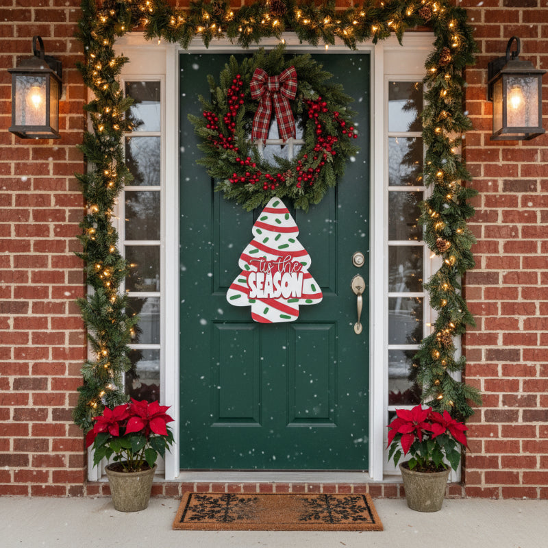 Person holding a Christmas-themed sign in front of a store entrance