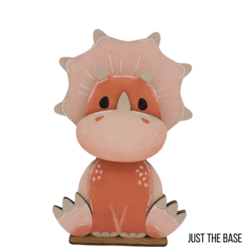 Cute dinosaur figurine with a pink shell on a white background